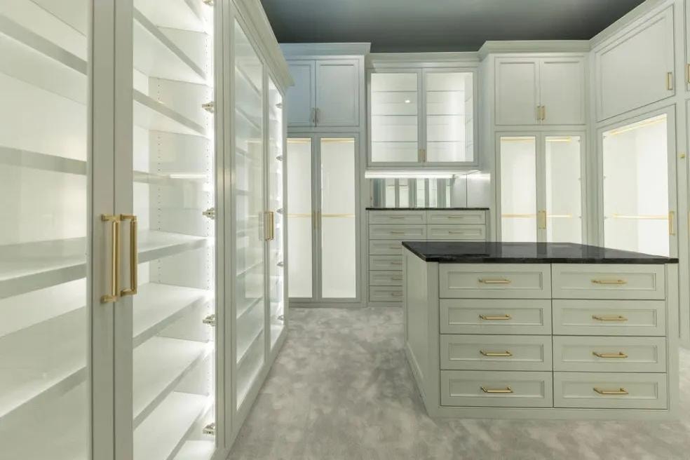 Glass-front walk-in with island